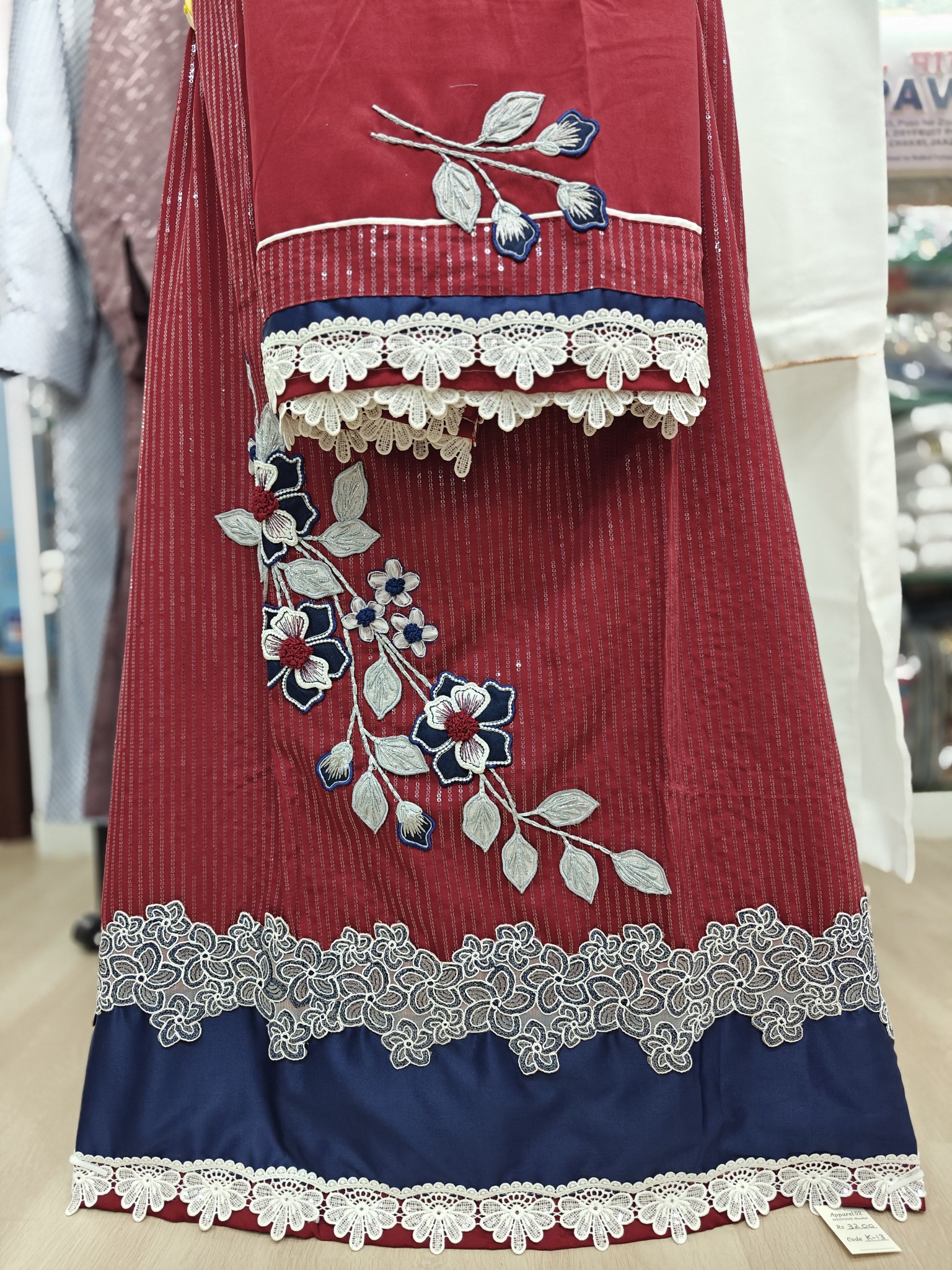   Red Rida with Sequence Work on Ghagra and Flower Bunch Patch